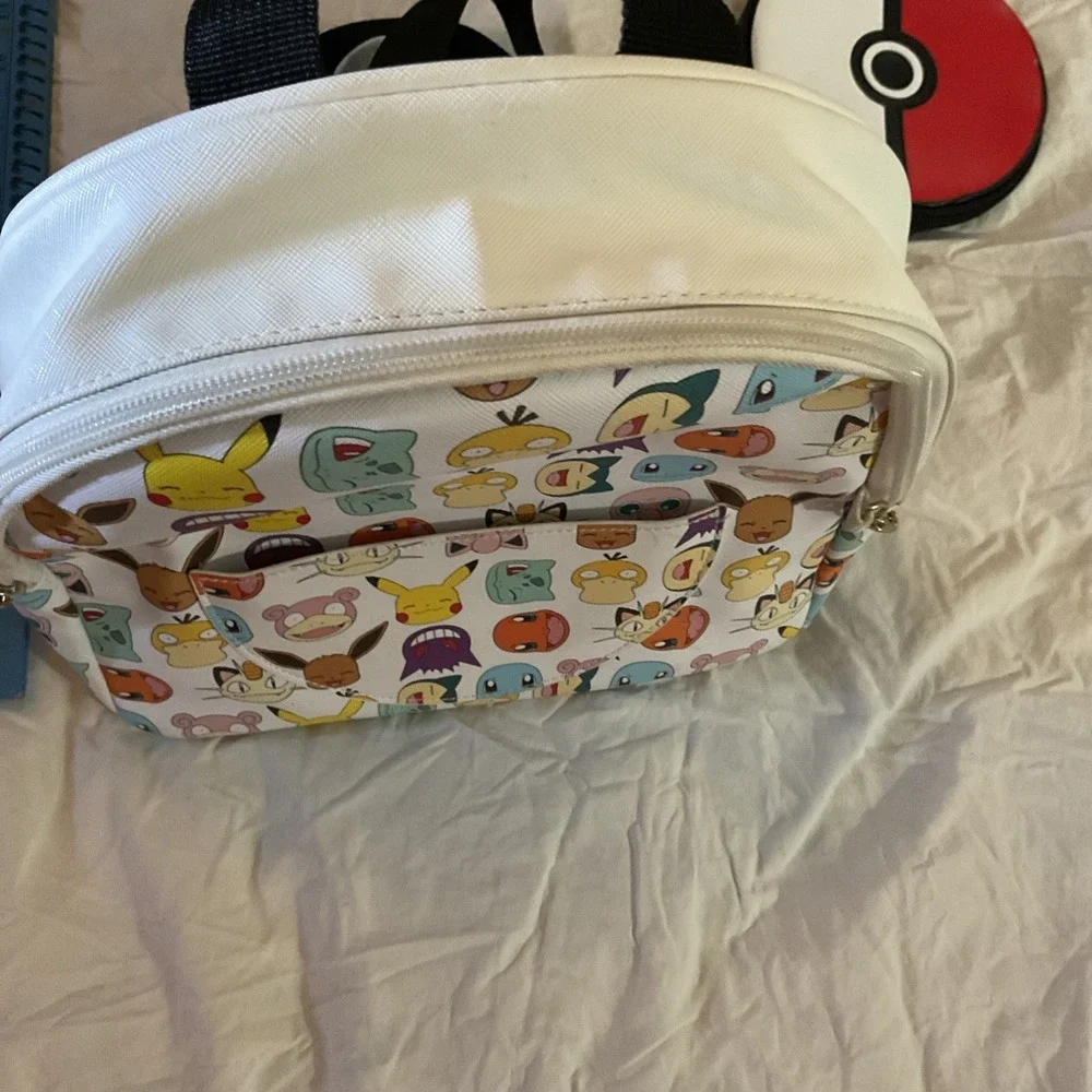 Pokemon‎ Pokeball Graphic Mini Backpack, Multi-Color  with chained zipper pouch.